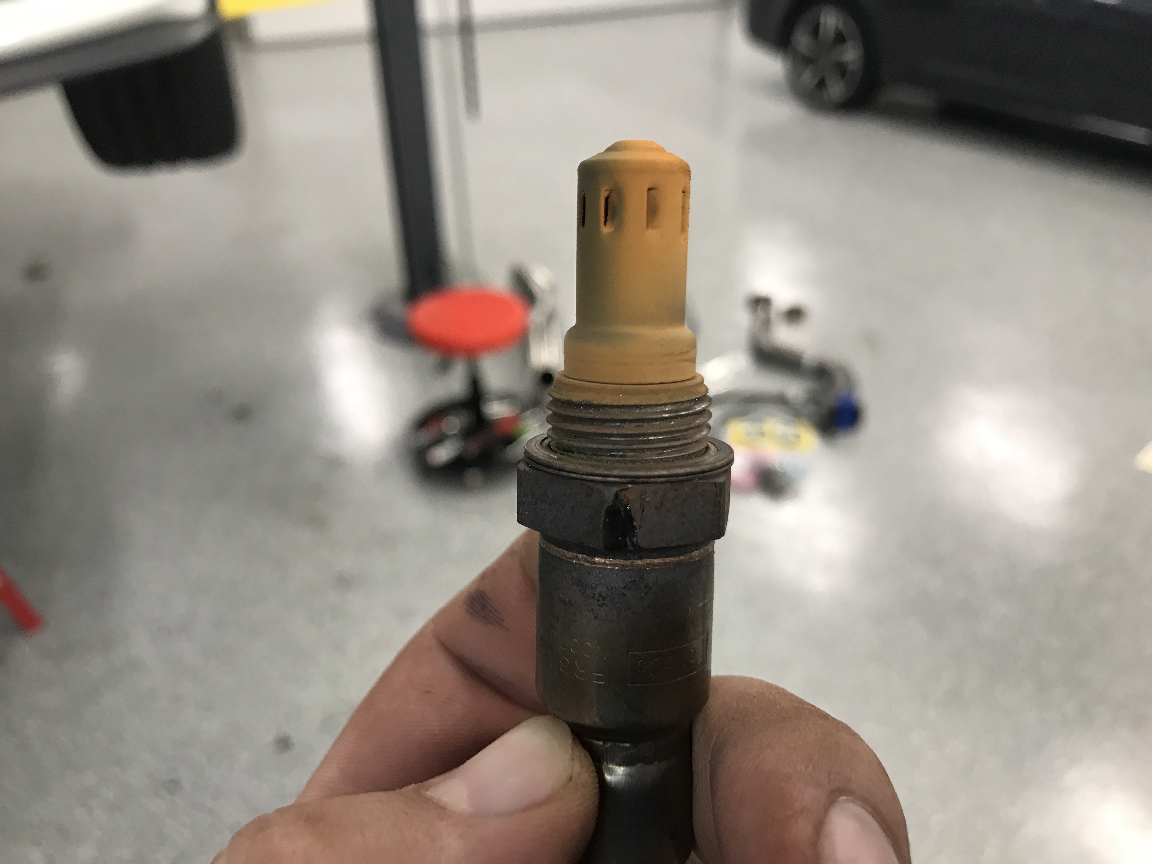 Orange O2 sensors? Orange spark plugs? What's happening!? Dmitry's Garage